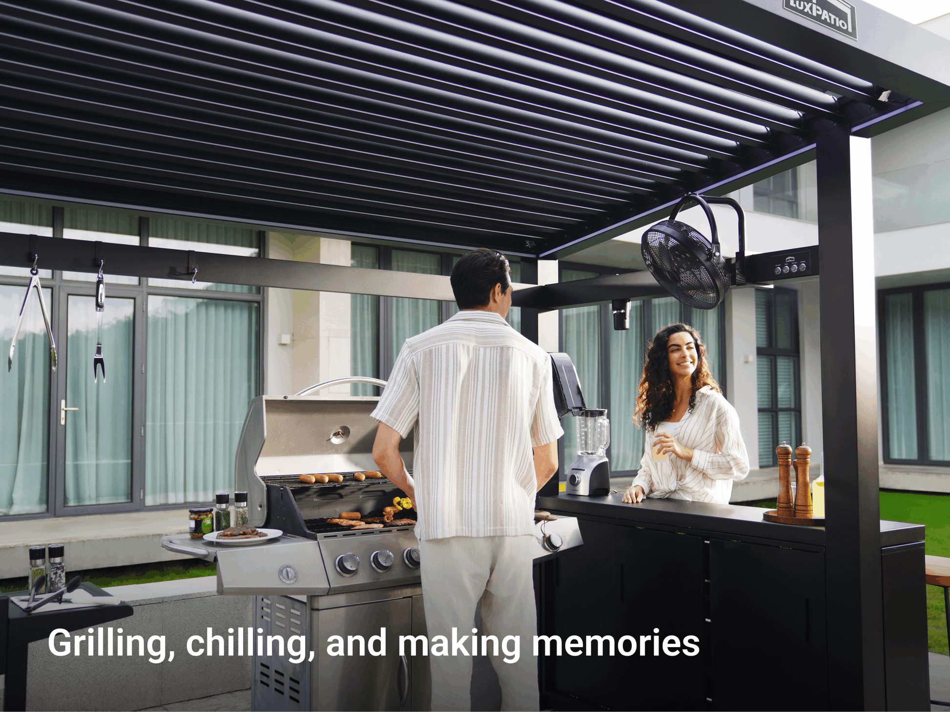 LuxPatio Grill Louvered Pergola Pro outdoor grilling setup, enjoying summer barbecue, black aluminum structure