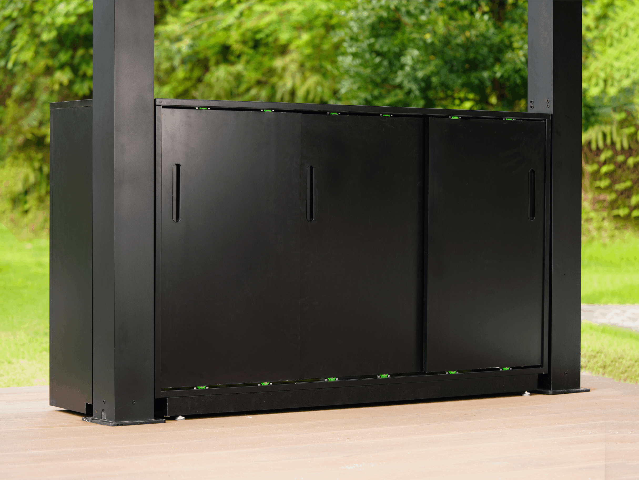 Black aluminum grill cabinet for NestGrill with sliding doors for outdoor kitchen storage..