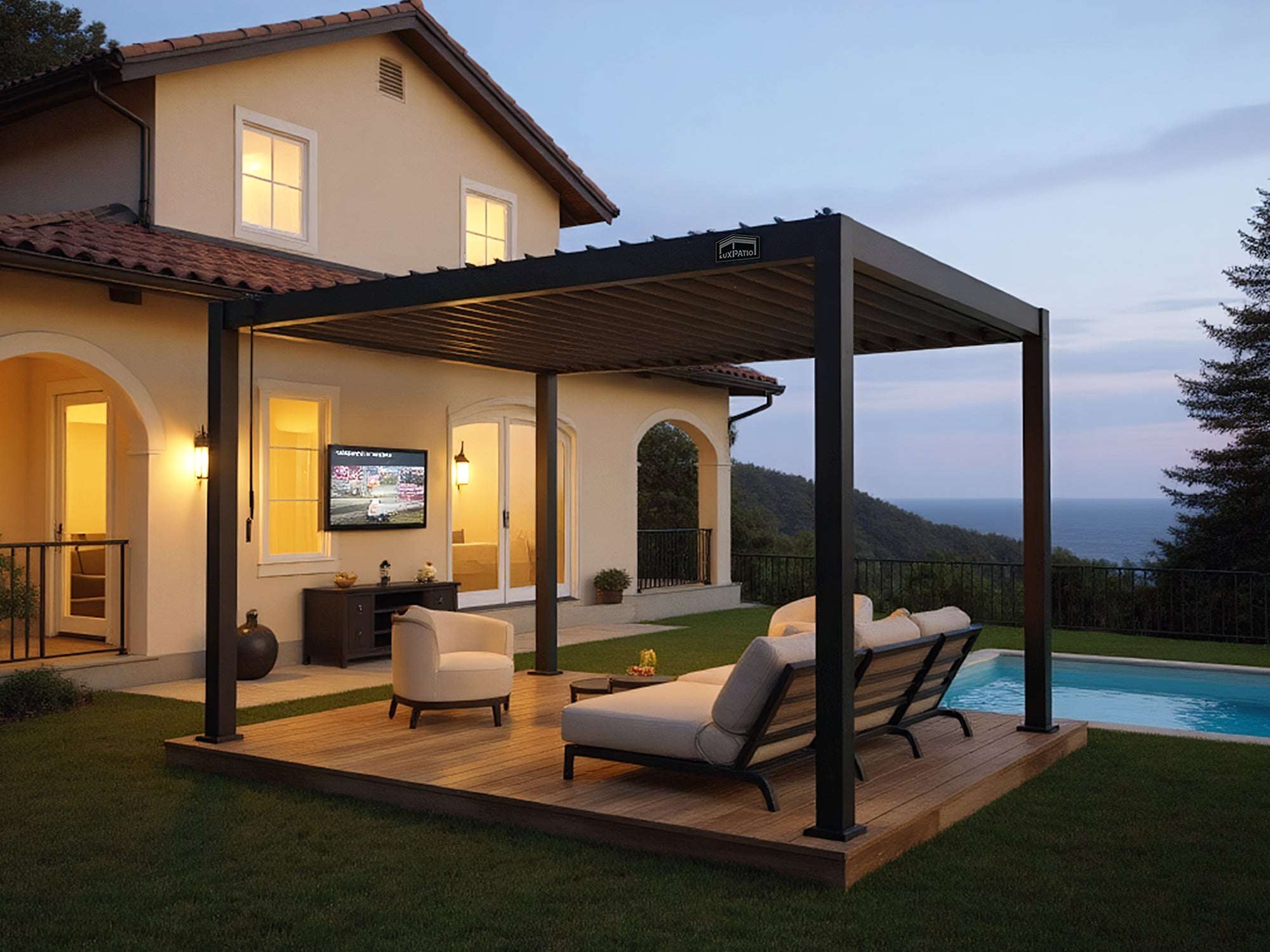 Black LuxPatio aluminum louvered pergola with deck, seating, and pool, creating a stylish outdoor living space.